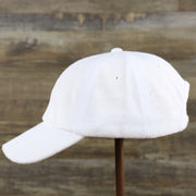 The wearer's left of the Blank Snow White Wash Cloth Baseball Hat | White Dad Hat