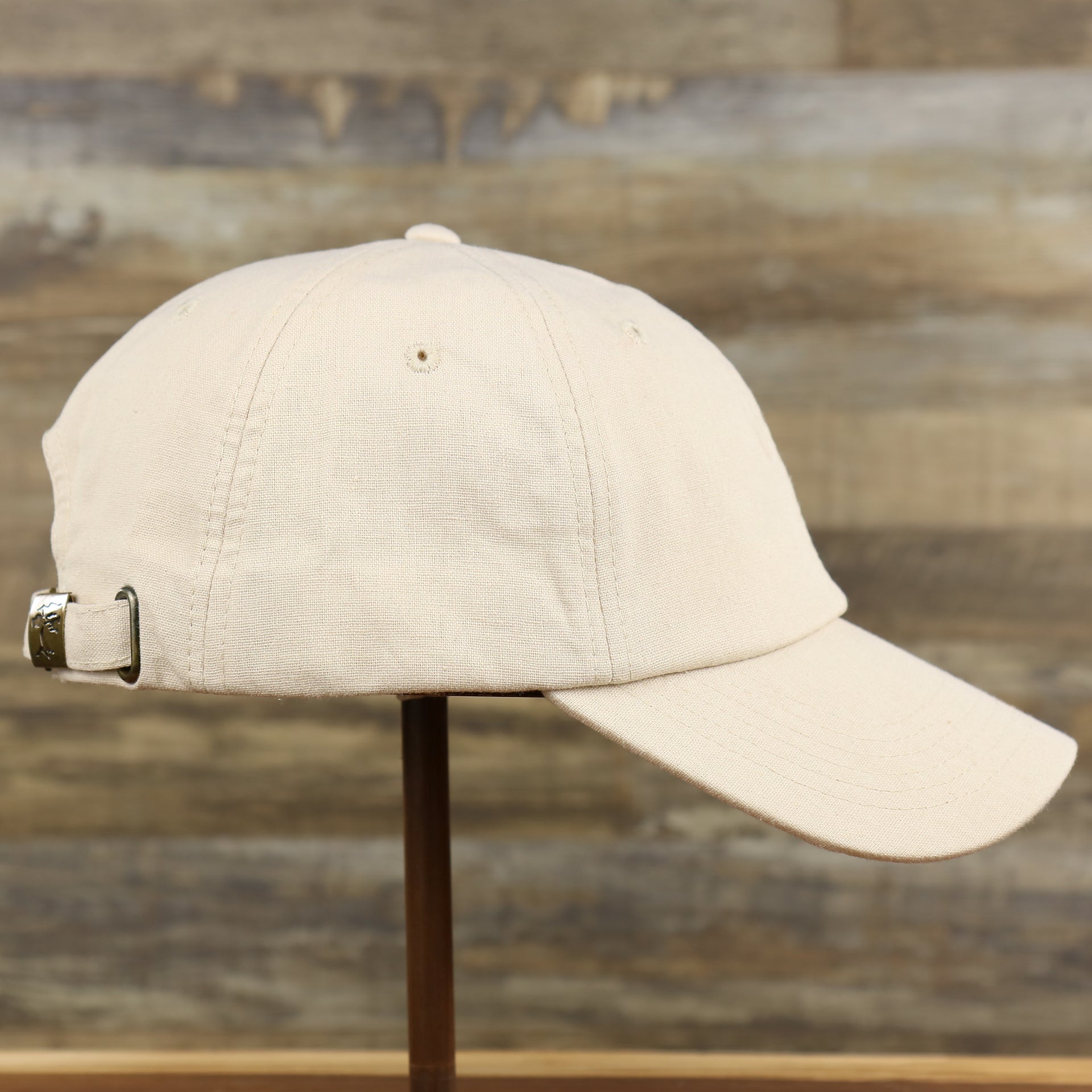 The wearer's right on the Khaki Linen Blank Baseball Hat | Blank Tan Dad Hat