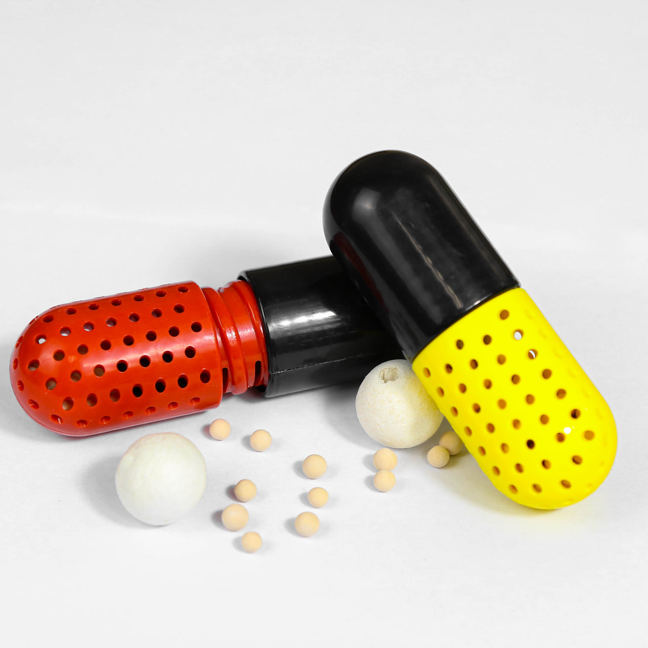 Two Pill Shape Sneaker Deodorizer Matching Bred 11s and Frozen Yellow | Yellow And Black / Red and Black Sneaker Deodorizers