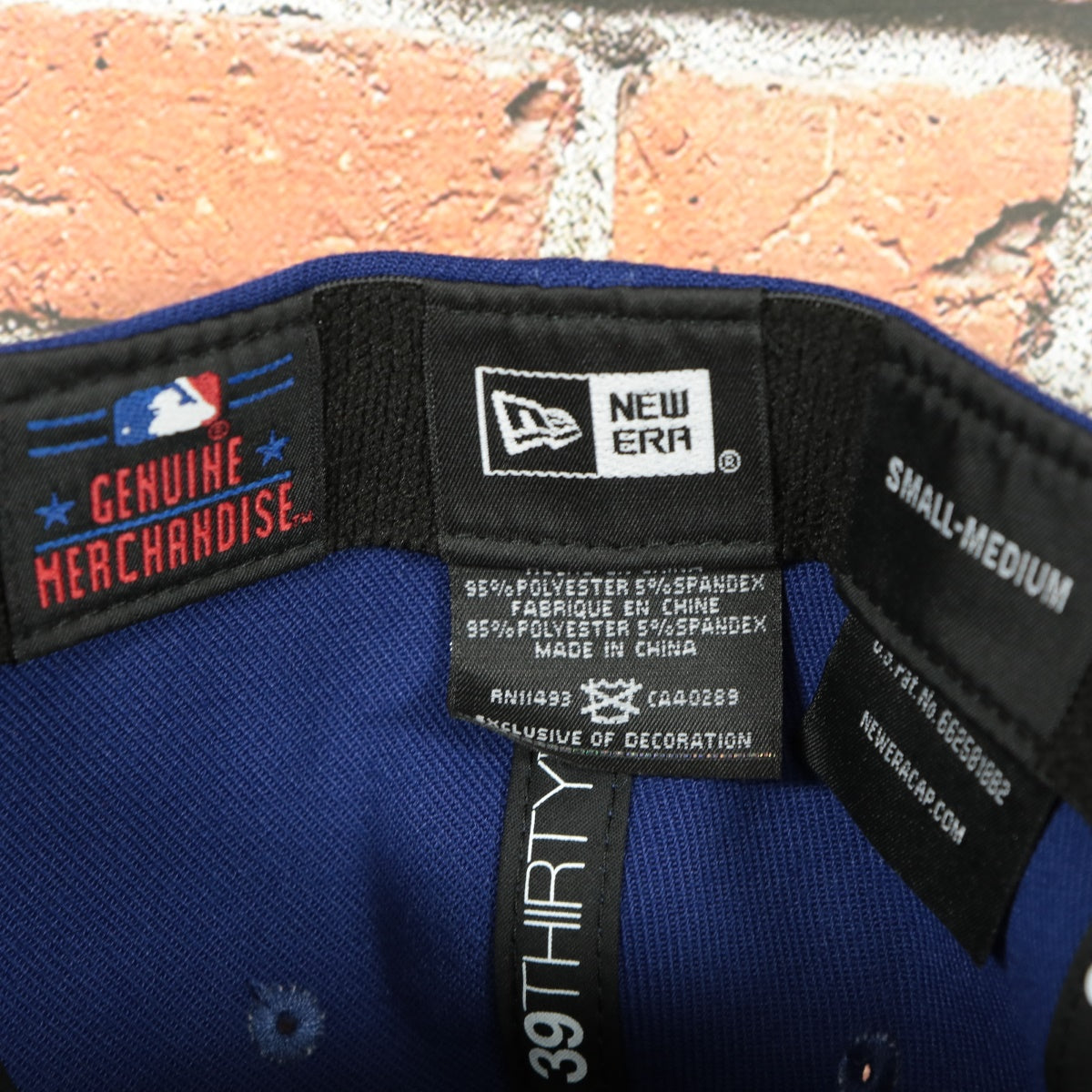 new era label on the Philadelphia Phillies Team Classic Phillies Wordmark 39Thirty Flexfit Cap | Blue 39Thirty Cap