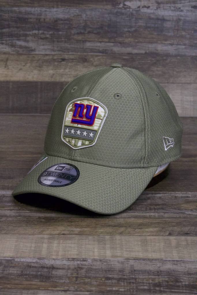 the New York Giants 2019 Salute to Service Dad Hat | Olive Green NFL On Field NY Giants Baseball Cap has a curved brim and a rubberized camo patch