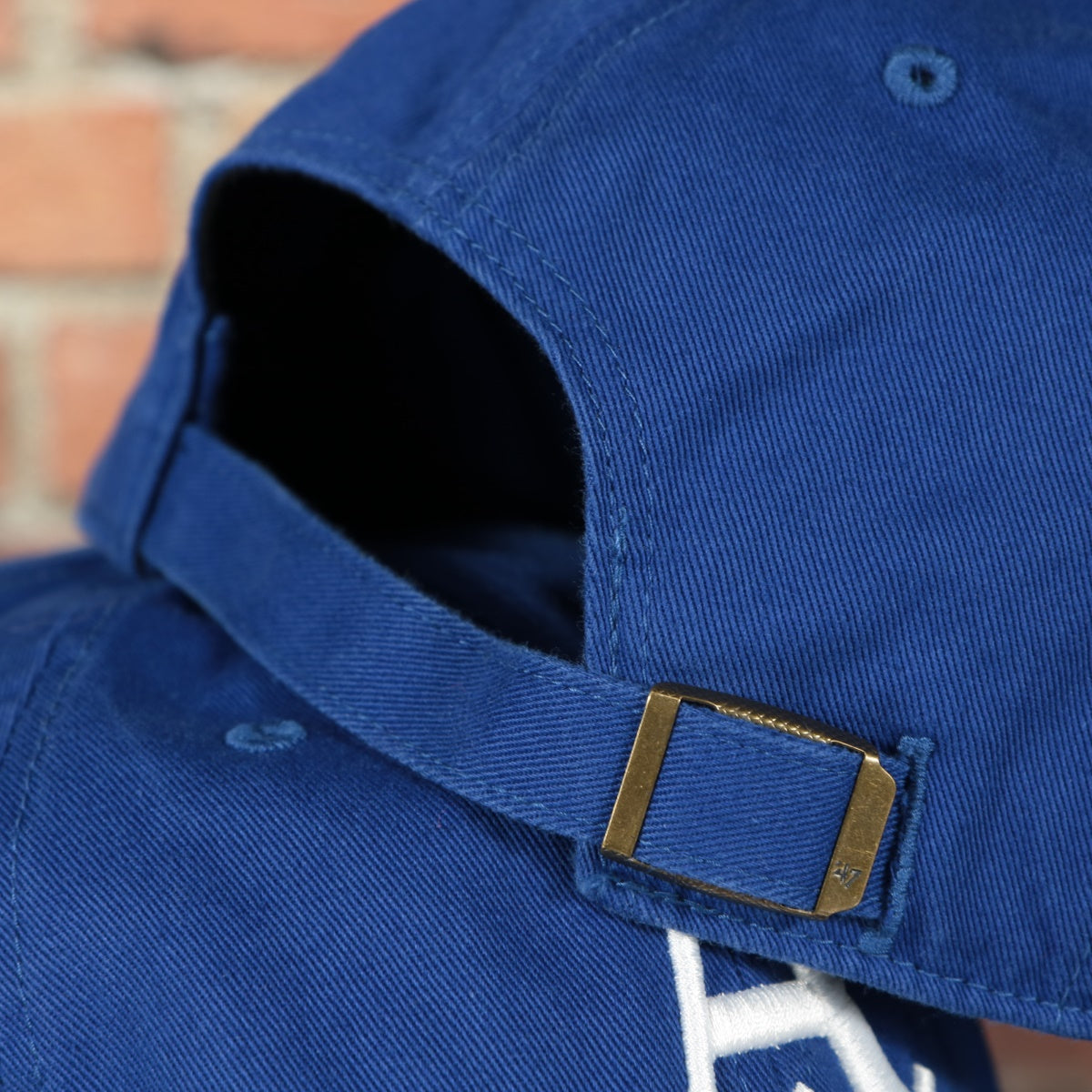 adjustable strap on the Philadelphia Athletics 1928 A Logo Retro Royal Blue Vintage MLB Cooperstown Dad Hat