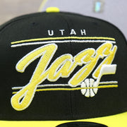 The Utah Jazz Team Script on the Utah Jazz Team Script Gray Bottom 9Fifty Snapback | Black and Yellow Snap Cap