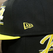 The New Era Logo on the Utah Jazz Team Script Gray Bottom 9Fifty Snapback | Black and Yellow Snap Cap