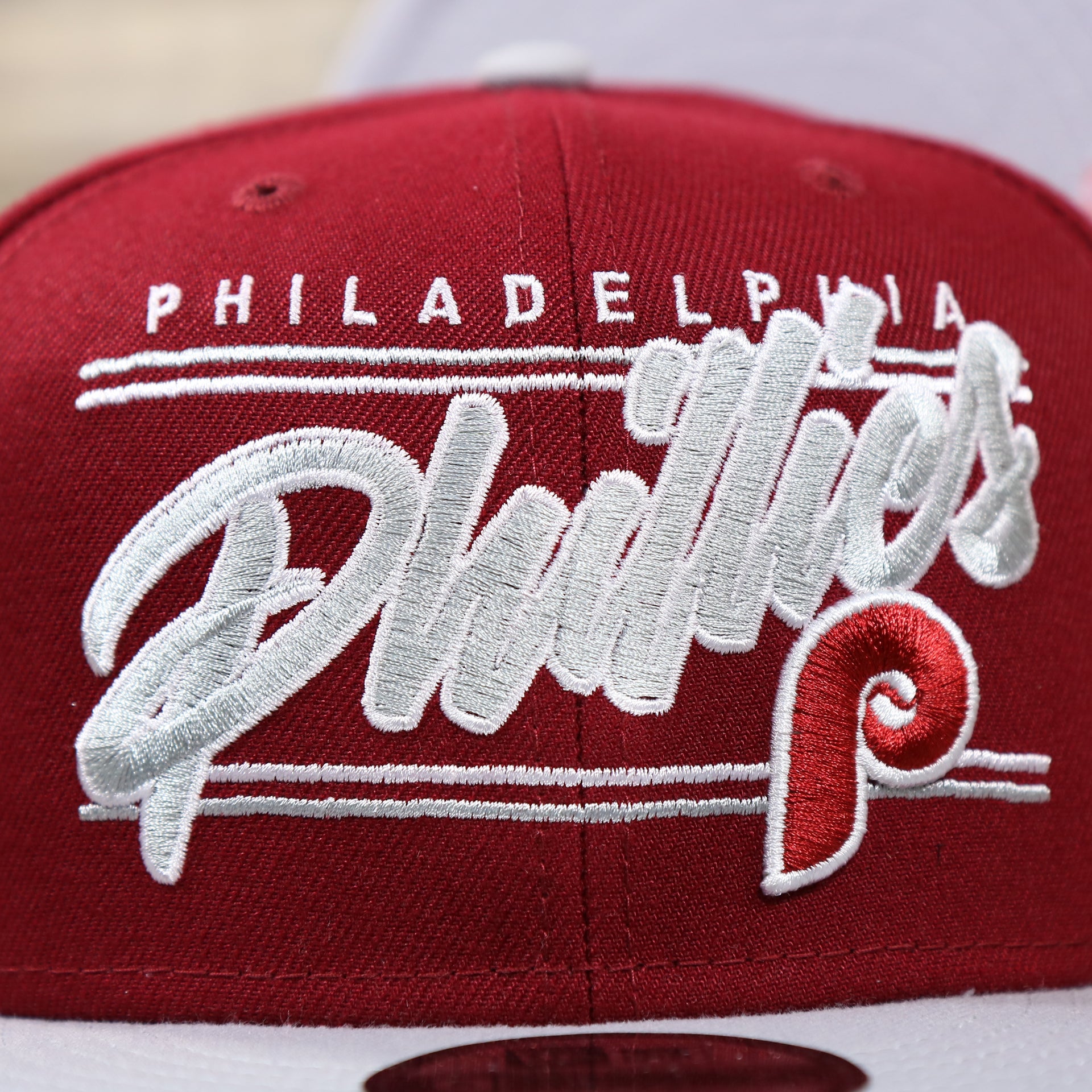 The Phillies Team Script on the Philadelphia Phillies Team Script Gray Bottom 9Fifty Snapback | Maroon And Grey Snap Cap