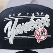 Front embroidery on the New York Yankees "Team Script" College Bar Style 9Fifty Snapback Hat | Vintage Logo, Navy/Grey