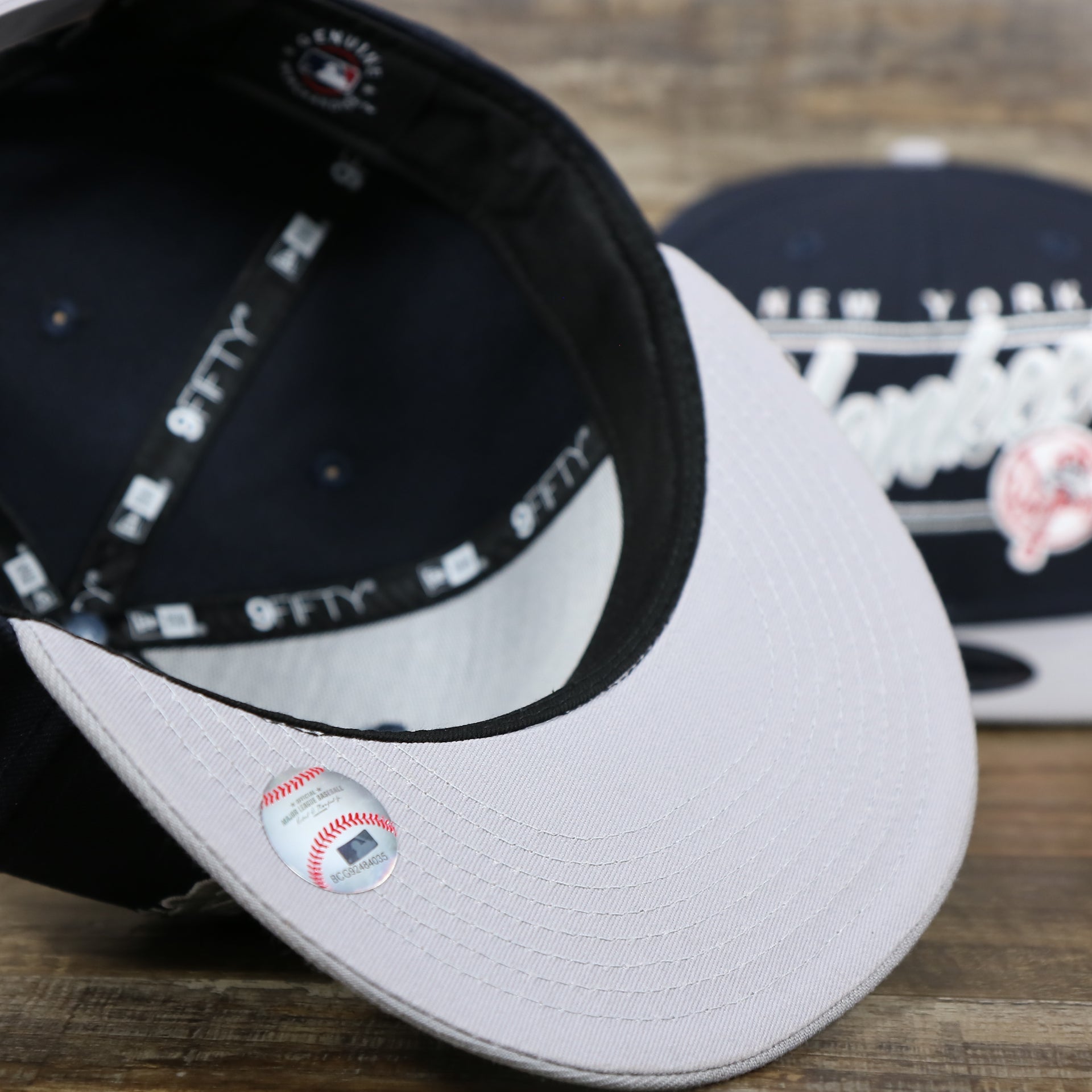 Grey under visor of the New York Yankees "Team Script" College Bar Style 9Fifty Snapback Hat | Vintage Logo, Navy/Grey