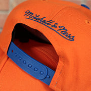 blue adjustable snap on the Florida Gators NCAA Jumbotron "Florida" Ripped Wordmark side patch Grey Bottom Yellow/Navy Snapback hat | Mitchell and Ness Two Tone Snap Cap