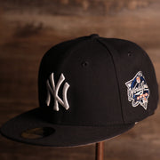 Yankees On-Field Grey Bottom Fitted Cap | New York Yankees 2000 Game Worn World Series Side Patch Gray Under Brim 59Fifty Fitted Hat the front of this cap has the yankees logo with the 2000 world series patch on the side