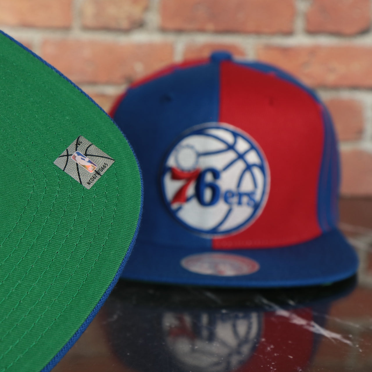 green under visor on the Philadelphia 76ers NBA What the Pinstripe Green Bottom Multicolored Snapback Hat | Mitchell and Ness Blue/Red/Black/White Snap cap