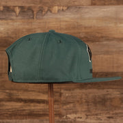Wearer's right of the Vintage Philadelphia Eagles Cap | 1933 Philadelphia x Pennsylvania Midnight Green 9Fifty Snapback Hat