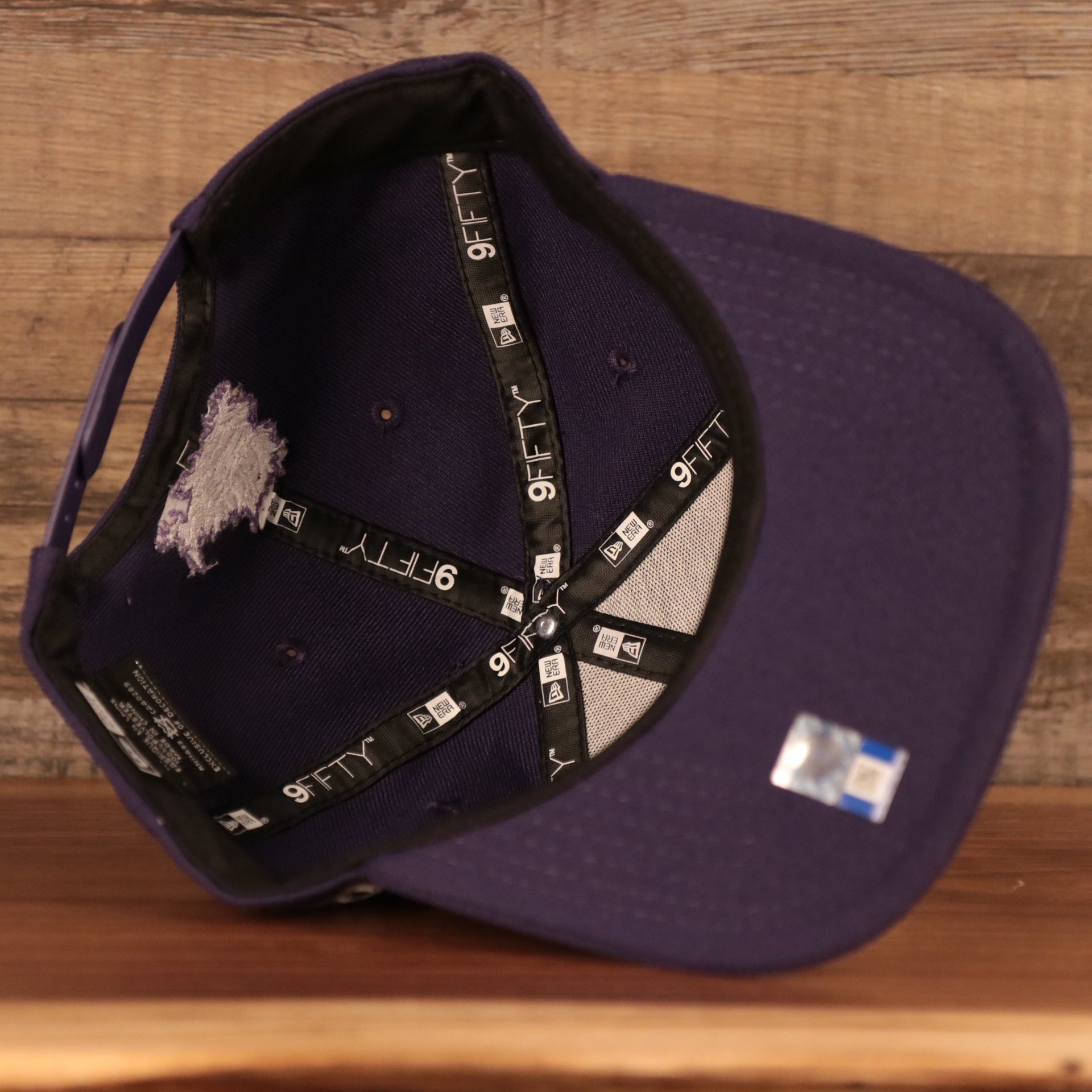underside of the TCU Horned Frogs Purple Adjustable Snapback Cap
