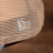 new era logo on the North Carolina Tar Heels Carolina Blue 9Twenty Distressed Adjustable Trucker Dad Hat