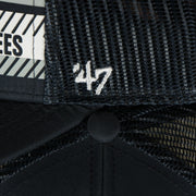 47 brand logo on the New York Yankees Mesh Back Printed Graphic Gray Bottom Trucker Hat | Mesh Back Navy Dad Hat