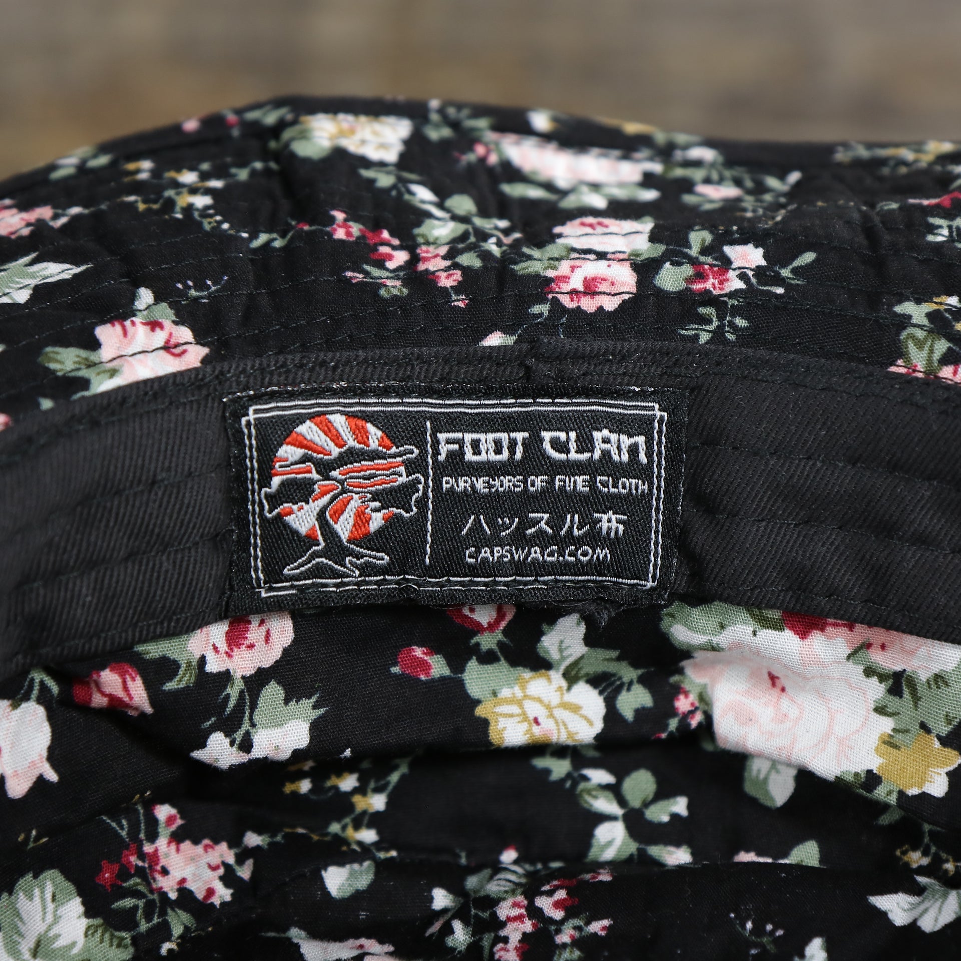 foot clan label on the Foot Clan Blank Black Floral Boonie Bucket Hat