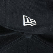 new era logo on the New York Yankees Gray Bottom 9Fifty Snapback Cap | Navy Blue Snap Cap
