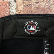 mlb label on the New York Yankees Gray Bottom 9Fifty Snapback Cap | Navy Blue Snap Cap
