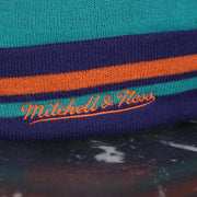 mitchell and ness logo on the Charlotte Hornets Retro Logo Two Sided Cuffed Winter Beanie | Purple And Light Blue Winter Beanie