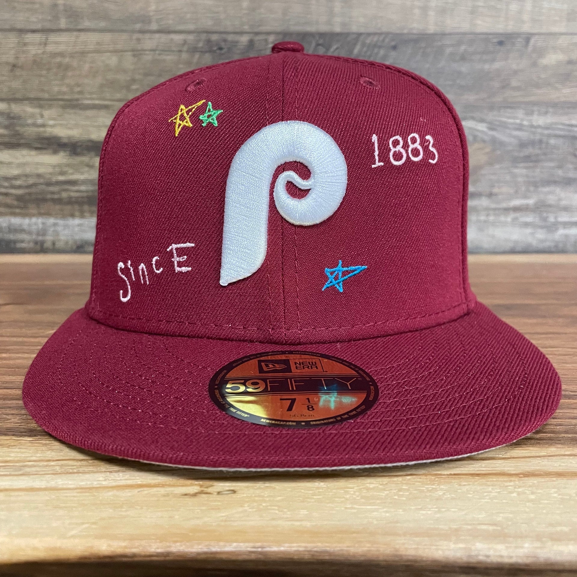 The front of the Philadelphia Phillies Cooperstown “Scribble” Side Patch Gray Bottom 59Fifty Fitted Cap