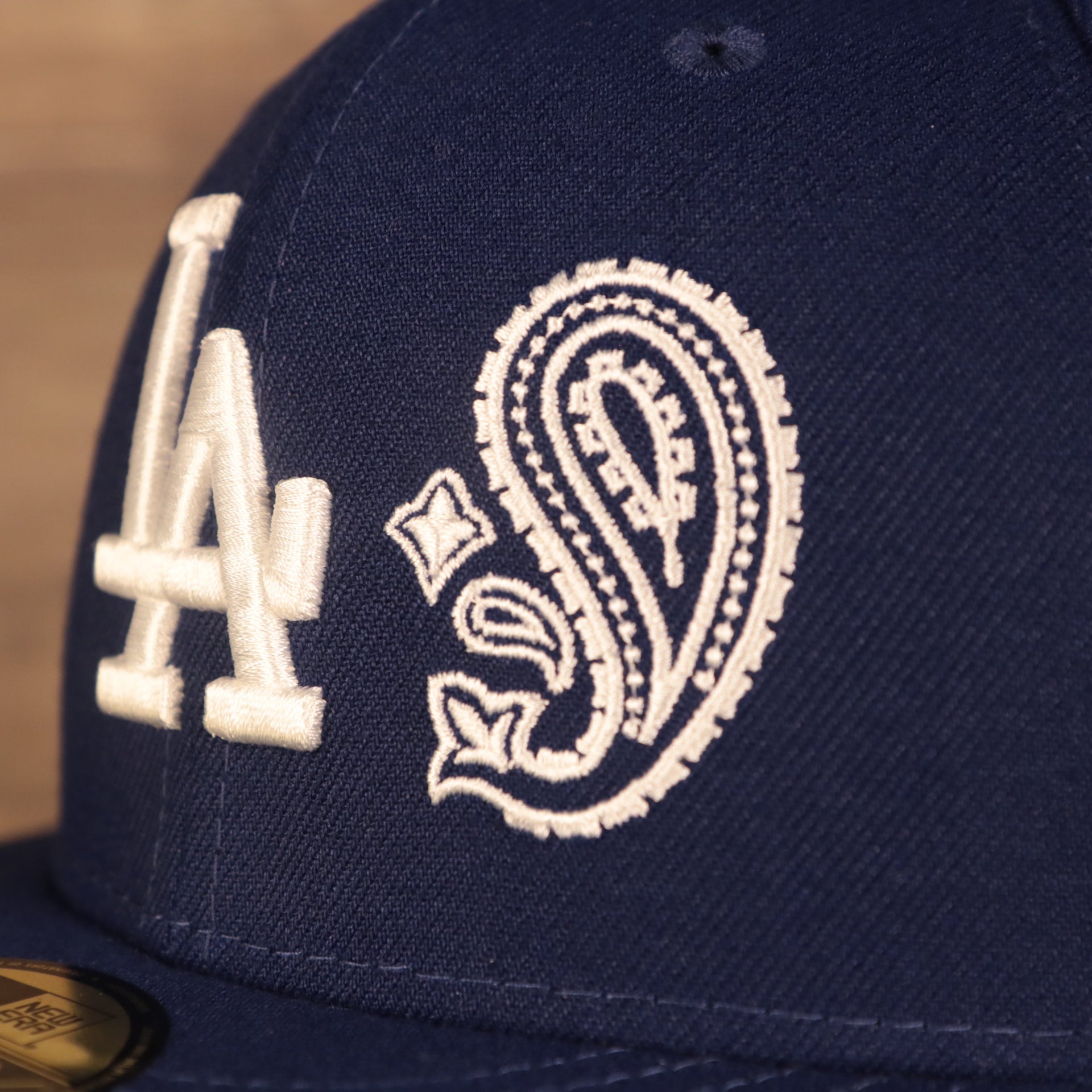 Close up paisley front accent for the Los Angeles Dodger Multi-Color Paisley Bandana Under Brim 59Fifty Fitted Cap