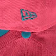 new era logo on the Lehigh Valley Ironpigs Coqui Copa De La Diversion 2023 Two-Tone Black Bottom 9Twenty Dad Hat | Pink/Blue 920