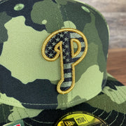 A close up of the Phillies logo on the Philadelphia Phillies 2022 Armed Forces Day / Memorial Day Side Patch 59Fifty Fitted Cap
