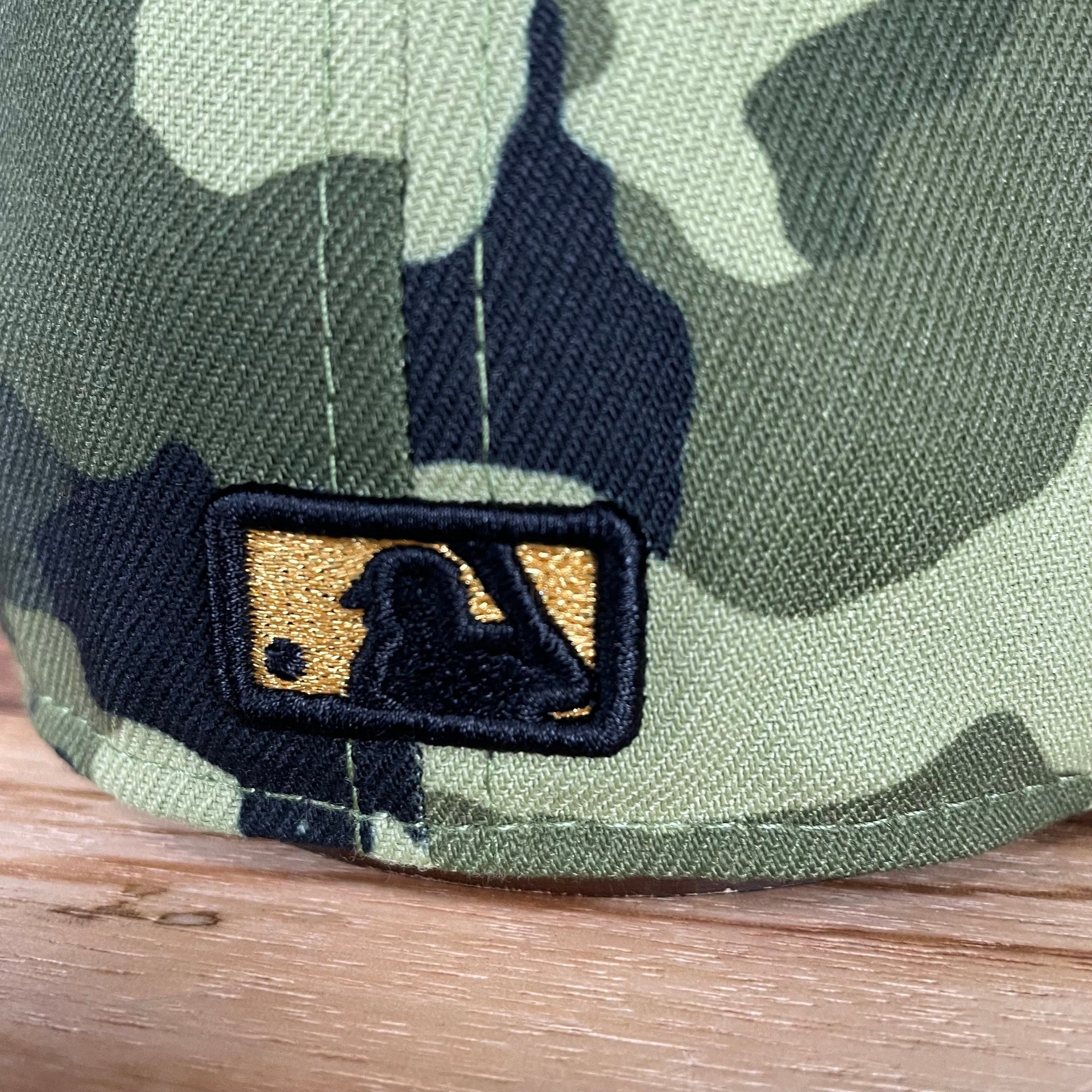 A close up of the MLB Batterman on the Philadelphia Phillies 2022 Armed Forces Day / Memorial Day Side Patch 59Fifty Fitted Cap