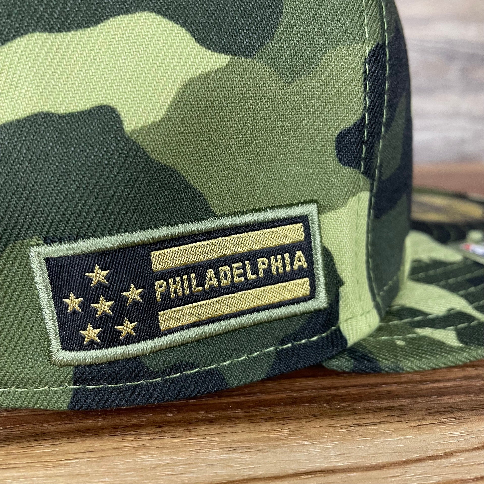 A close up of the stars and stripes side patch on the Philadelphia Phillies 2022 Armed Forces Day / Memorial Day Side Patch 59Fifty Fitted Cap