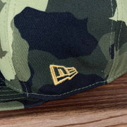 A close up of the new era logo on the New York Mets 2022 Armed Forces Day / Memorial Day Side Patch 59Fifty Fitted Cap