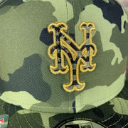 A close up of the Mets logo on the New York Mets 2022 Armed Forces Day / Memorial Day Side Patch 9Fifty Snapback Cap