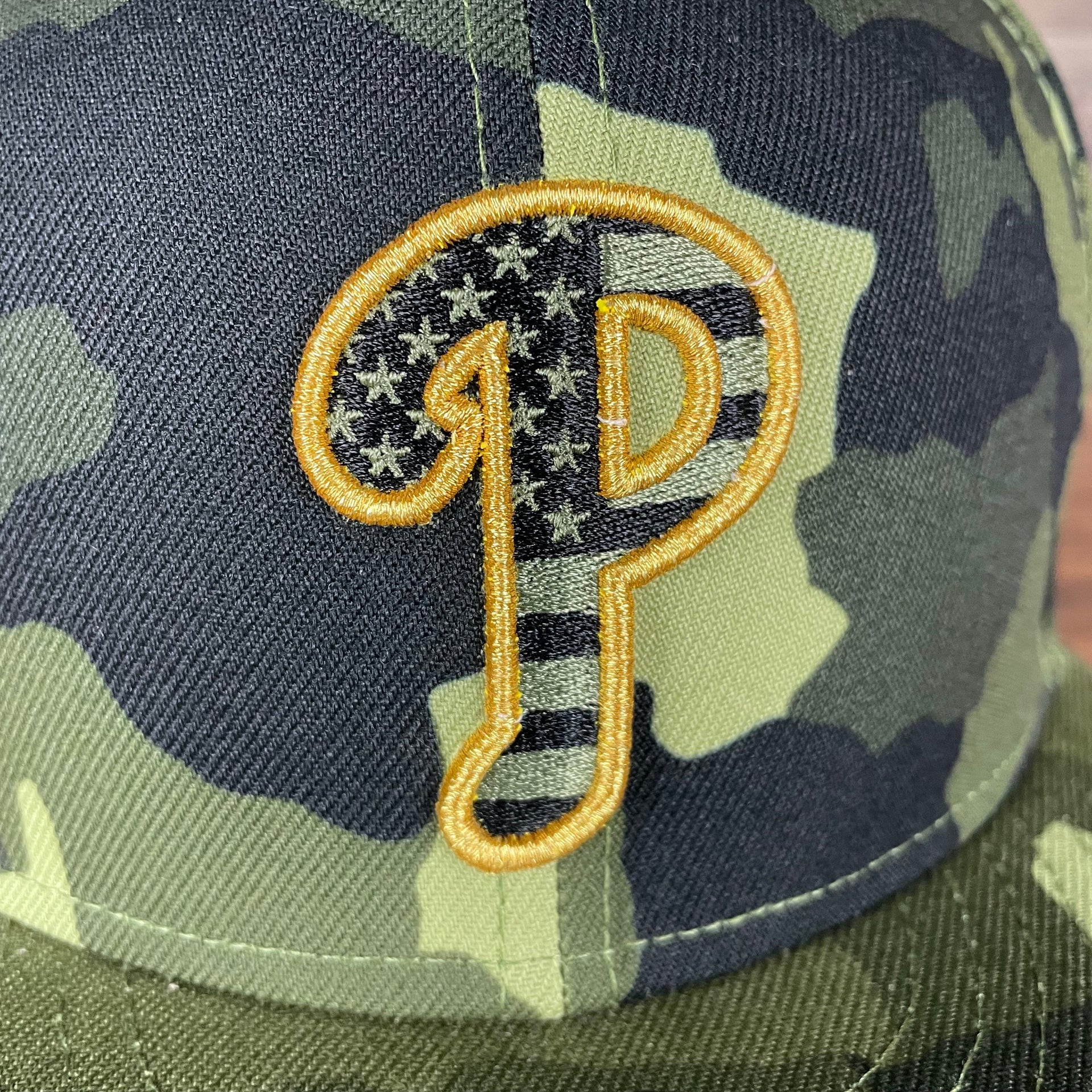 A close up of the Philadelphia Phillies 2022 Armed Forces Day / Memorial Day Side Patch 9Fifty Snapback