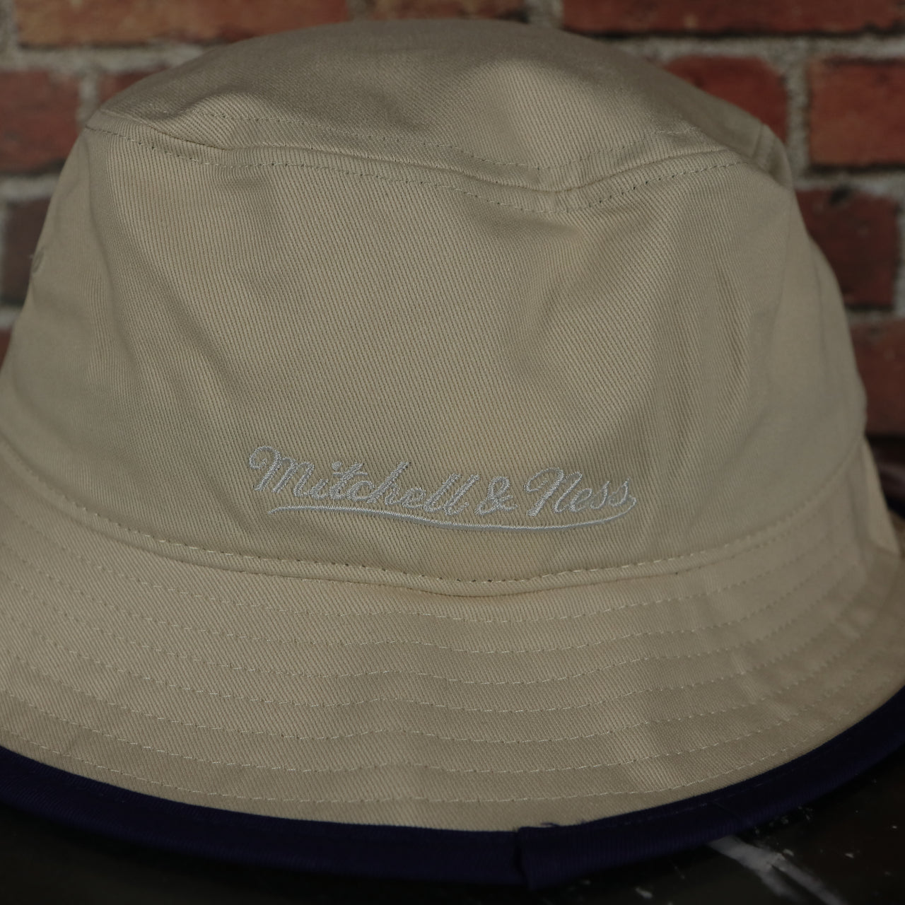 Toronto Raptors Hardwood Classics Vintage Logo Off White Bucket Hat