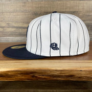 The wearer's left on the New York Giants Cooperstown 5950 Day Side Patch Green Bottom 59Fifty Fitted Cap