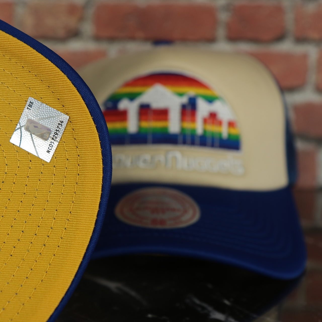 Denver Nuggets Vintage "Denver" wordmark Yellow Bottom 2-Tone Foam Trucker Hat | Royal Blue/Off-White Mitchell and Ness Hat