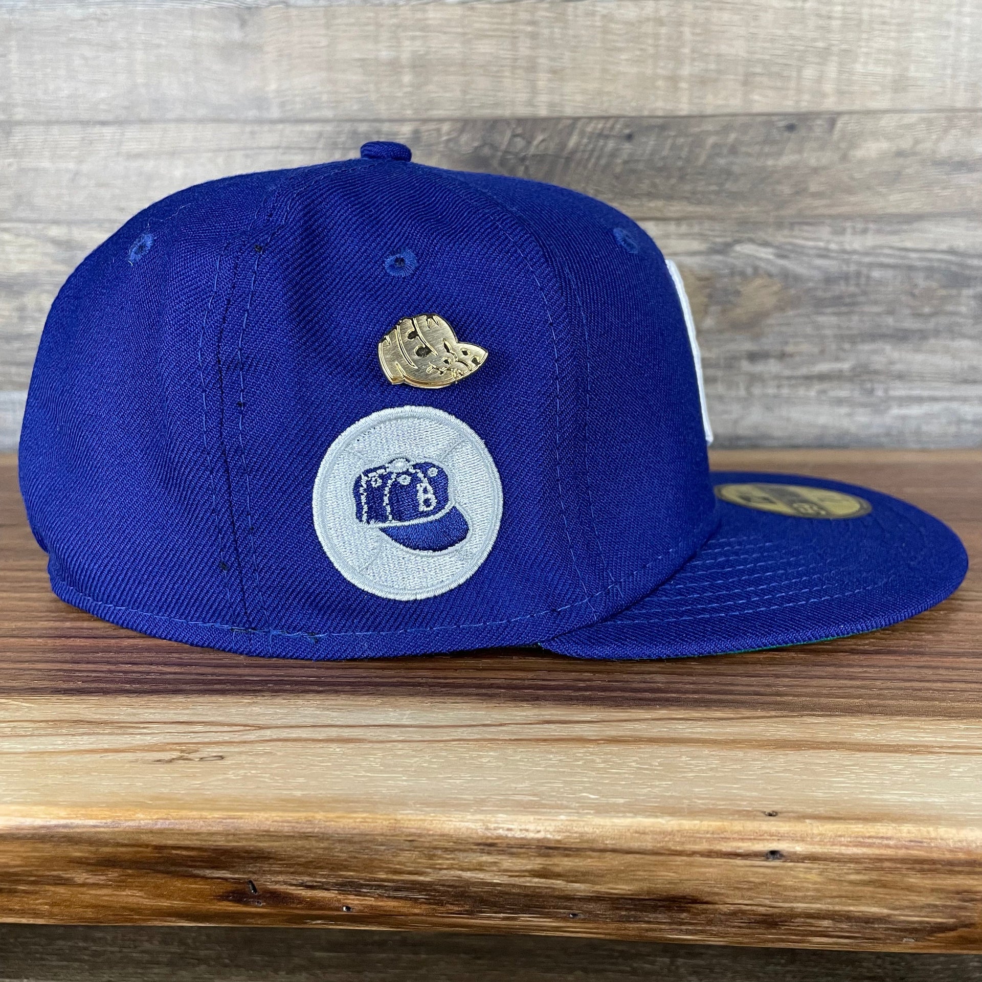 The wearer's right on the Brooklyn Dodgers Cooperstown 5950 Day Side Patch Green Bottom 59Fifty Fitted Cap