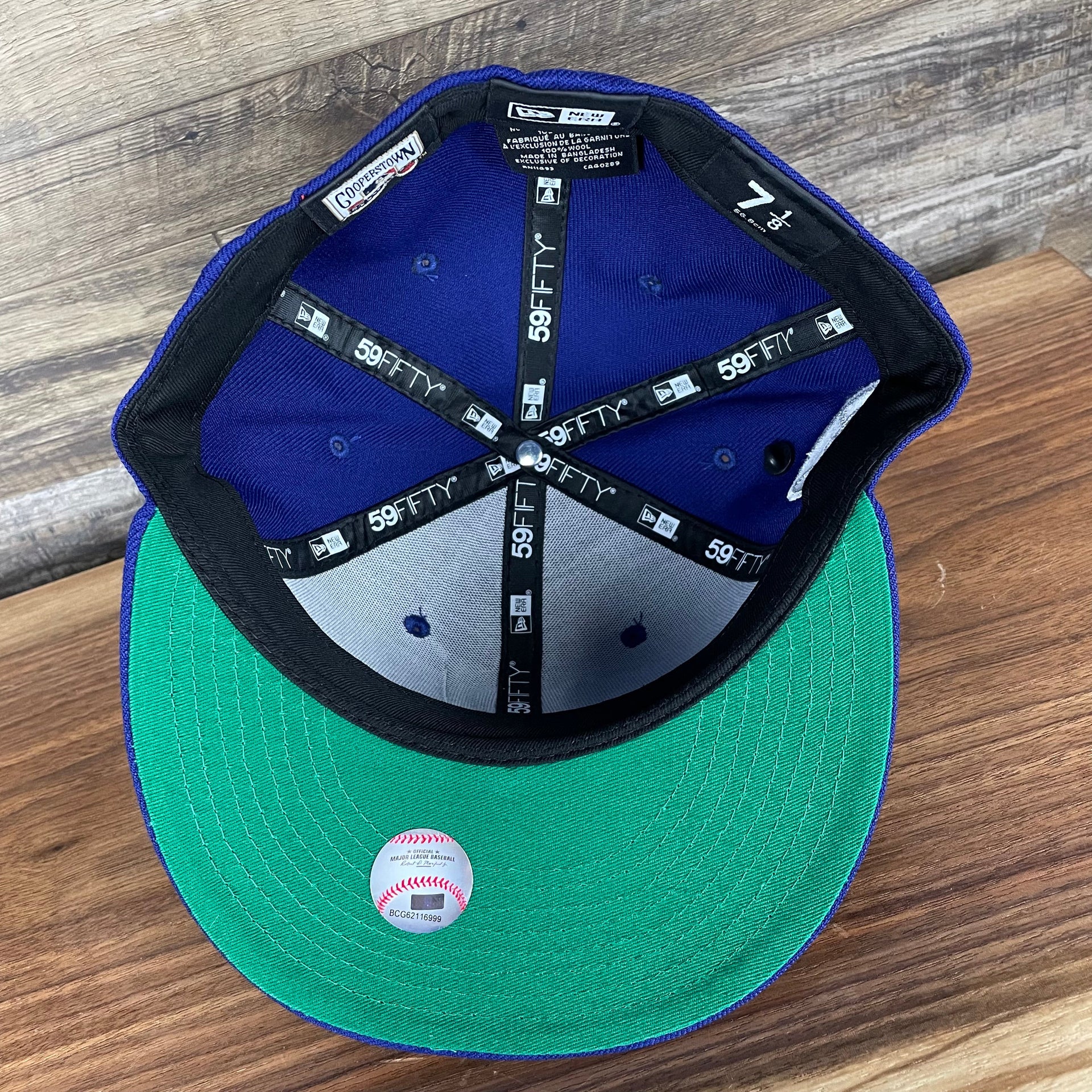 The underside of the Brooklyn Dodgers Cooperstown 5950 Day Side Patch Green Bottom 59Fifty Fitted Cap