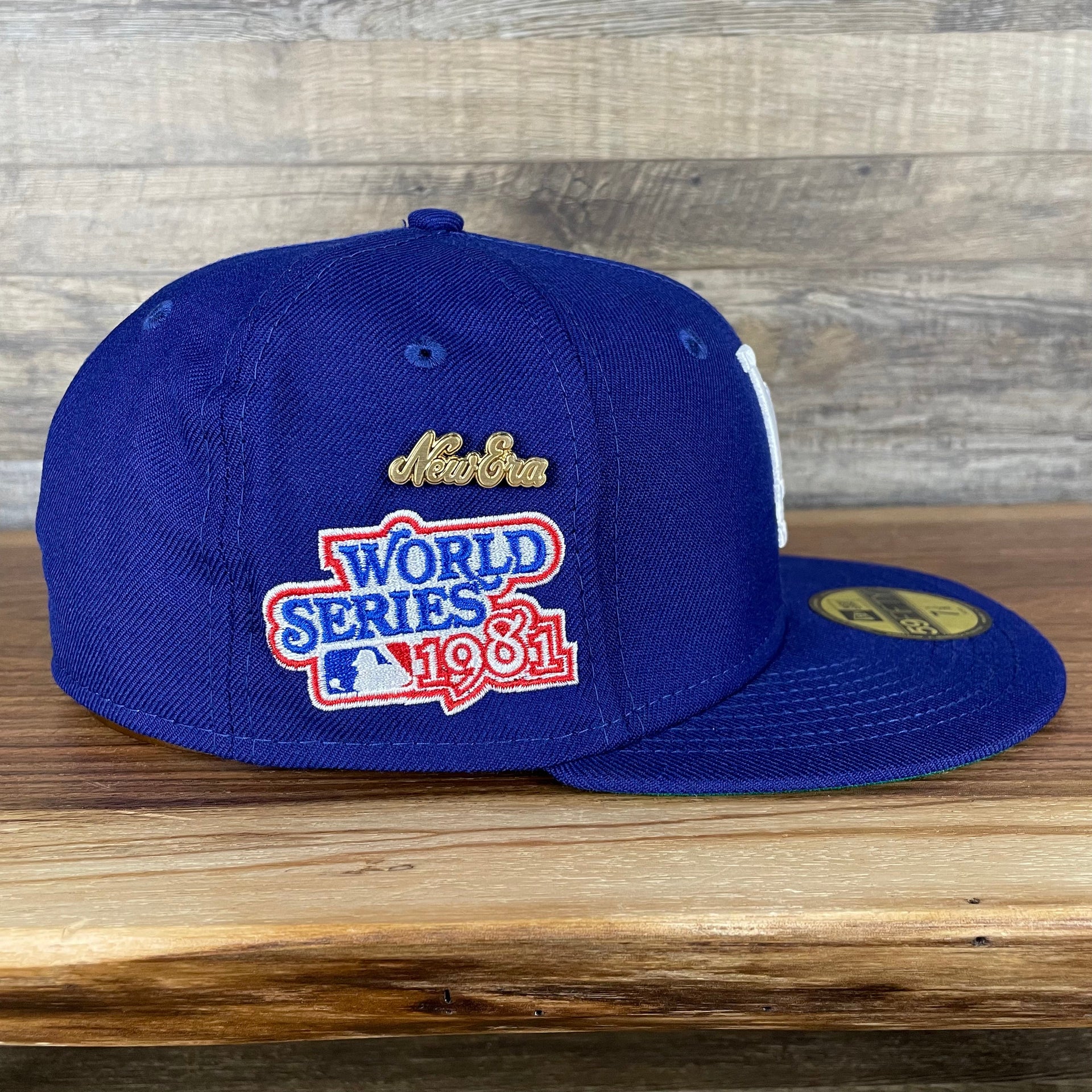 The wearer's right on the Los Angeles Dodgers Cooperstown 5950 Day Side Patch Green Bottom 59Fifty Fitted Cap
