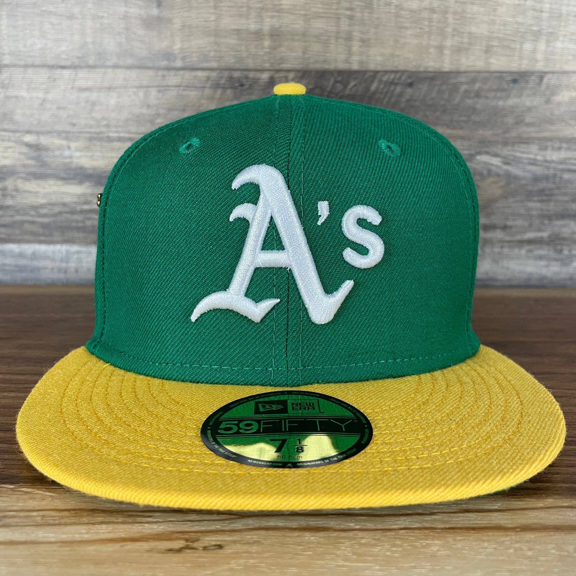 The front of the Oakland Athletics Cooperstown 5950 Day Side Patch Green Bottom 59Fifty Fitted Cap