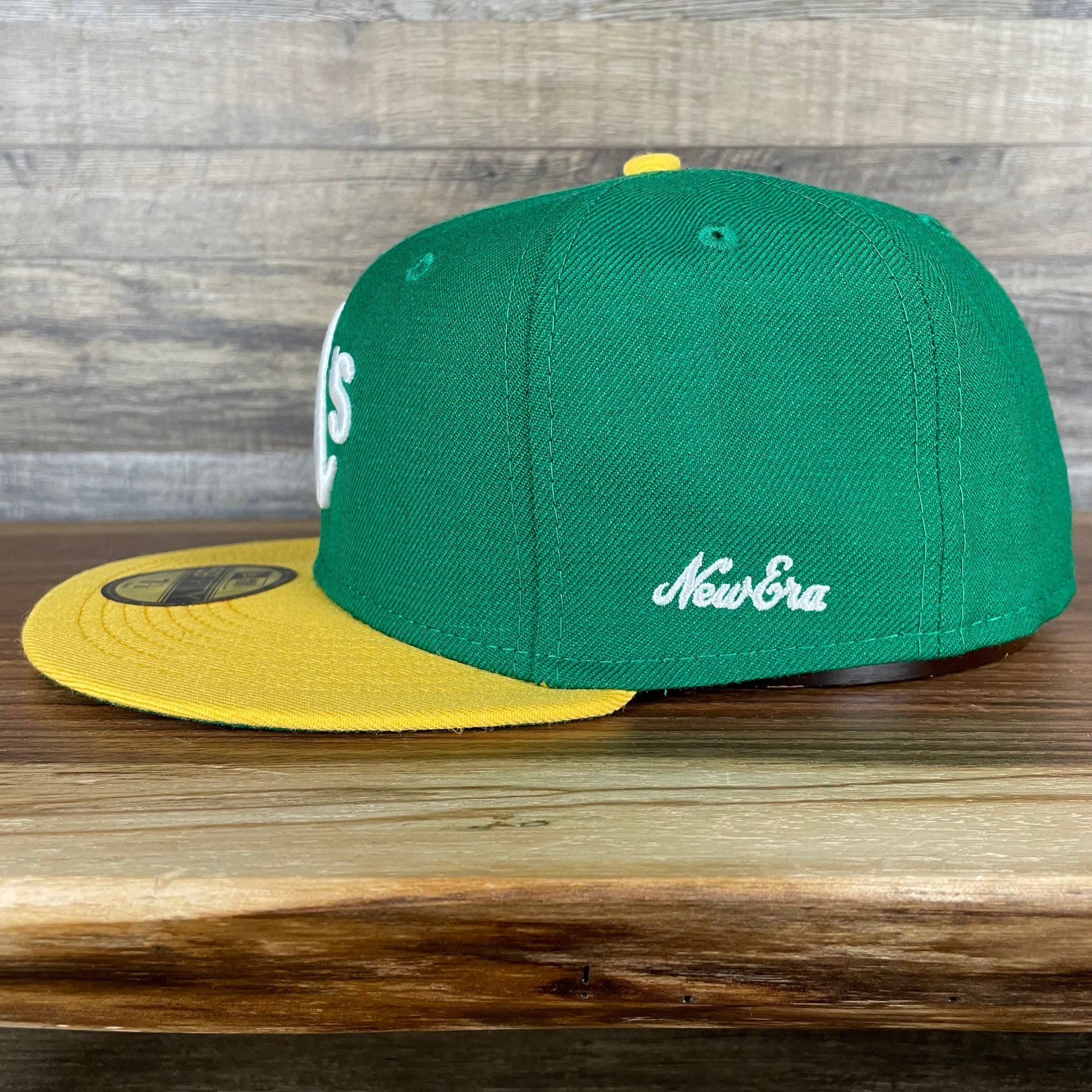 The wearer's left on the Oakland Athletics Cooperstown 5950 Day Side Patch Green Bottom 59Fifty Fitted Cap