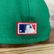 A close up of the Cooperstown MLB Batterman on the Oakland Athletics Cooperstown 5950 Day Side Patch Green Bottom 59Fifty Fitted Cap