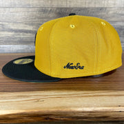 The wearer's left on the Pittsburgh Pirates Cooperstown 5950 Day Side Patch Green Bottom 59Fifty Fitted Cap