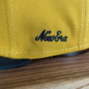 A close up of the 1970s New Era logo on the Pittsburgh Pirates Cooperstown 5950 Day Side Patch Green Bottom 59Fifty Fitted Cap