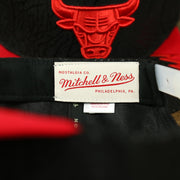 Mitchell and Ness label on the interior of the Chicago Bulls “NBA Day 5” Satin Bred 5s Matching Snapback Hat | Snapback to match Satin Bred 5s