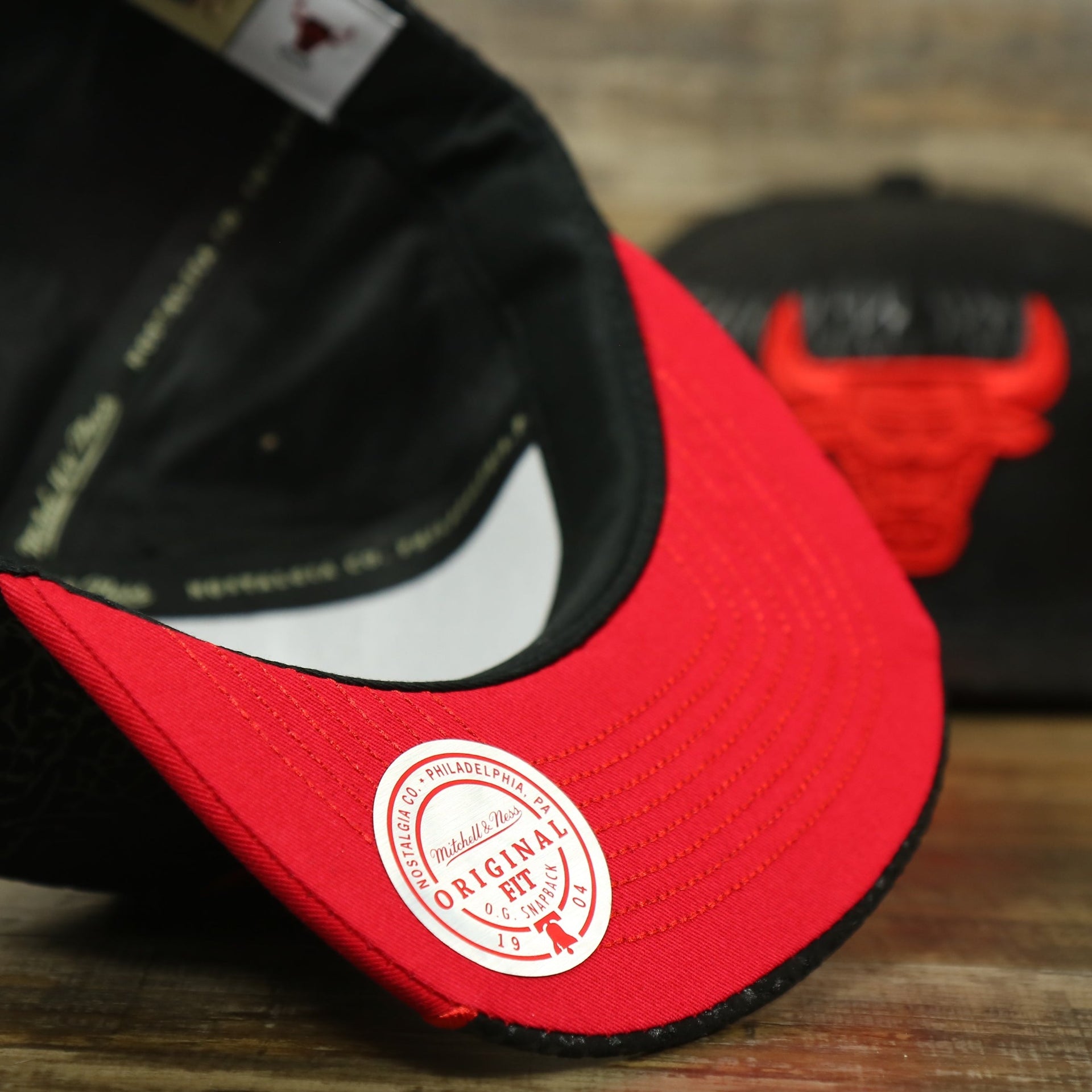 Red under visor of the Chicago Bulls “NBA Day 5” Satin Bred 5s Matching Snapback Hat | Snapback to match Satin Bred 5s