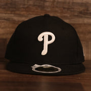 front side of the Philadelphia Phillies White Logo Black Bottom Black 59Fifty Fitted Cap | Youth