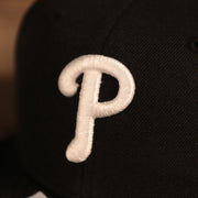 phillies logo on the Philadelphia Phillies White Logo Black Bottom Black 59Fifty Fitted Cap | Youth