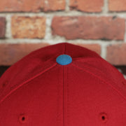 blue button on the Washington Capitals 2-Tone Fitted Cap Green Bottom | Blue/Red Cap