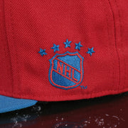 NHL logo on the Washington Capitals 2-Tone Fitted Cap Green Bottom | Blue/Red Cap