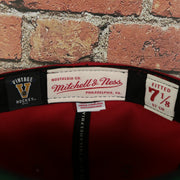 mitchell and ness label on the Washington Capitals 2-Tone Fitted Cap Green Bottom | Blue/Red Cap