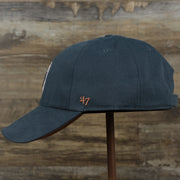 The wearer's left on the Cooperstown Houston Astros Cooperstown Collection Side Patch Leather Brown Undervisor Dad Hat | Vintage Navy Dad Hat